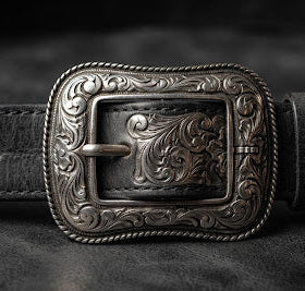Hebilla personalizada estilo western con opciones de grabado, figuras, piedras y acabados en plata, cobre o bronce.